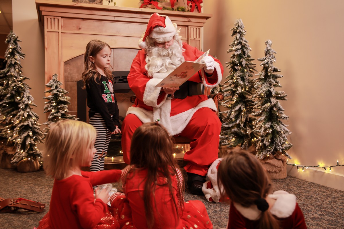 Compass Realty and Santa raise money for WVU Medicine Children's